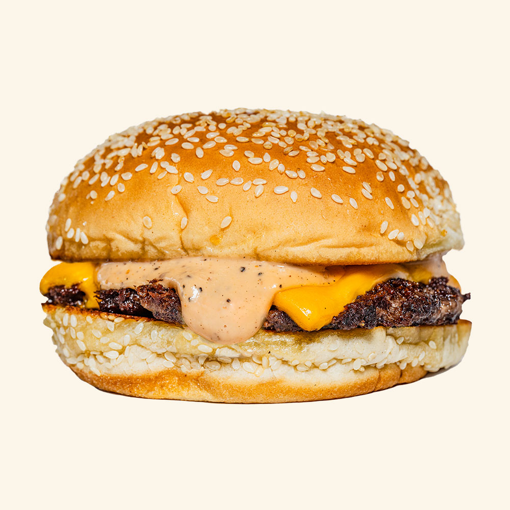 Cheeseburger on sesame seed bun