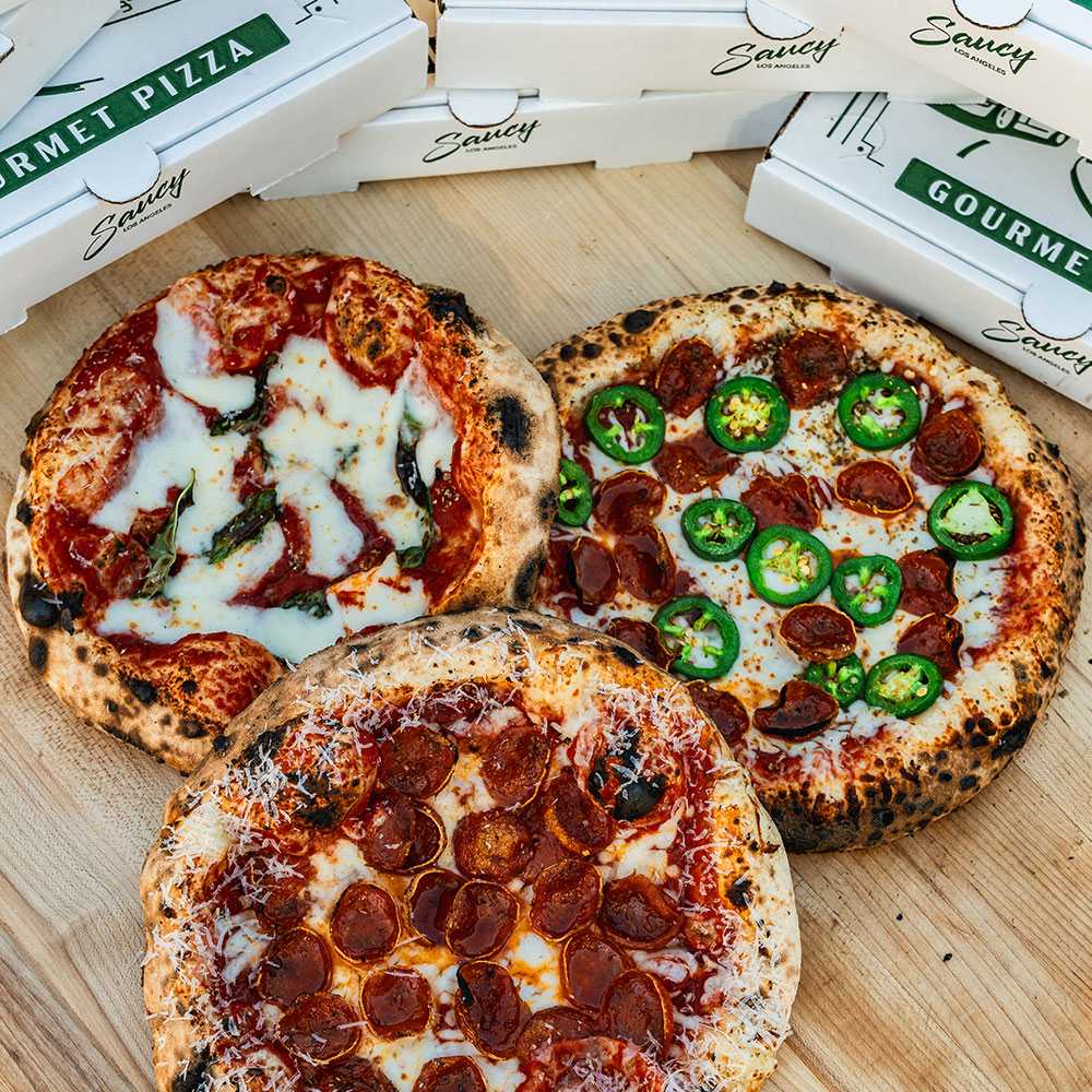 Variety of wood fired pizzas