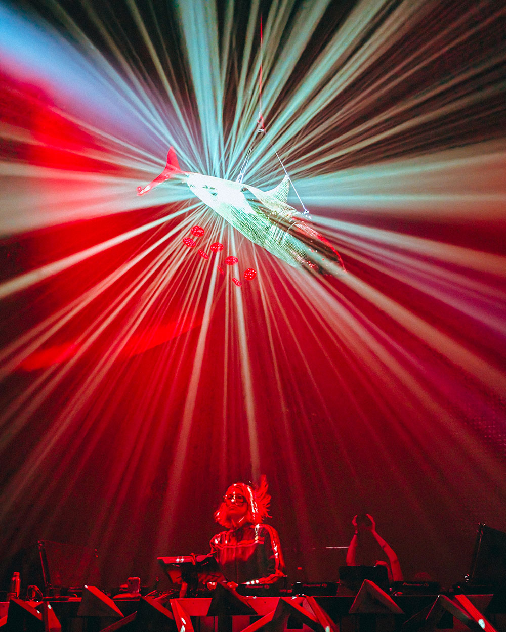 DJ performing under lights